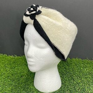 Platania Wool Blend Head Wrap with floral accent. One size.